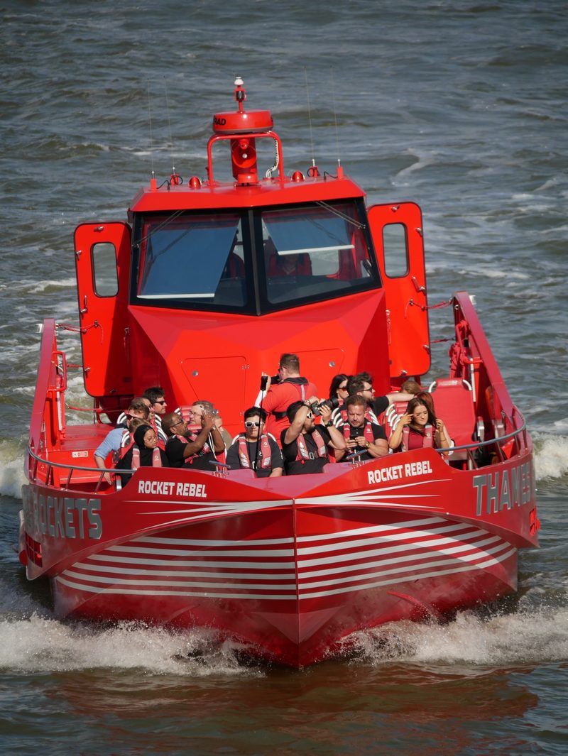 Red Thames Clipper on the river