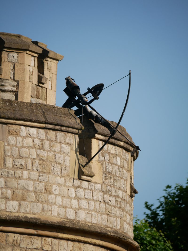 Statue of an archer atop a tower