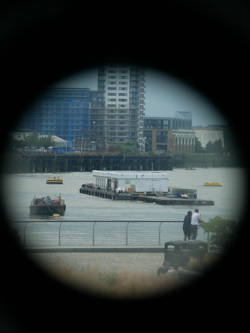 Riverside towers through a telescope